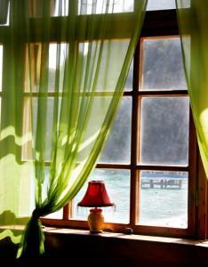 9620581 Fotolia okno 234x300 - wooden window with sea view in old hotel